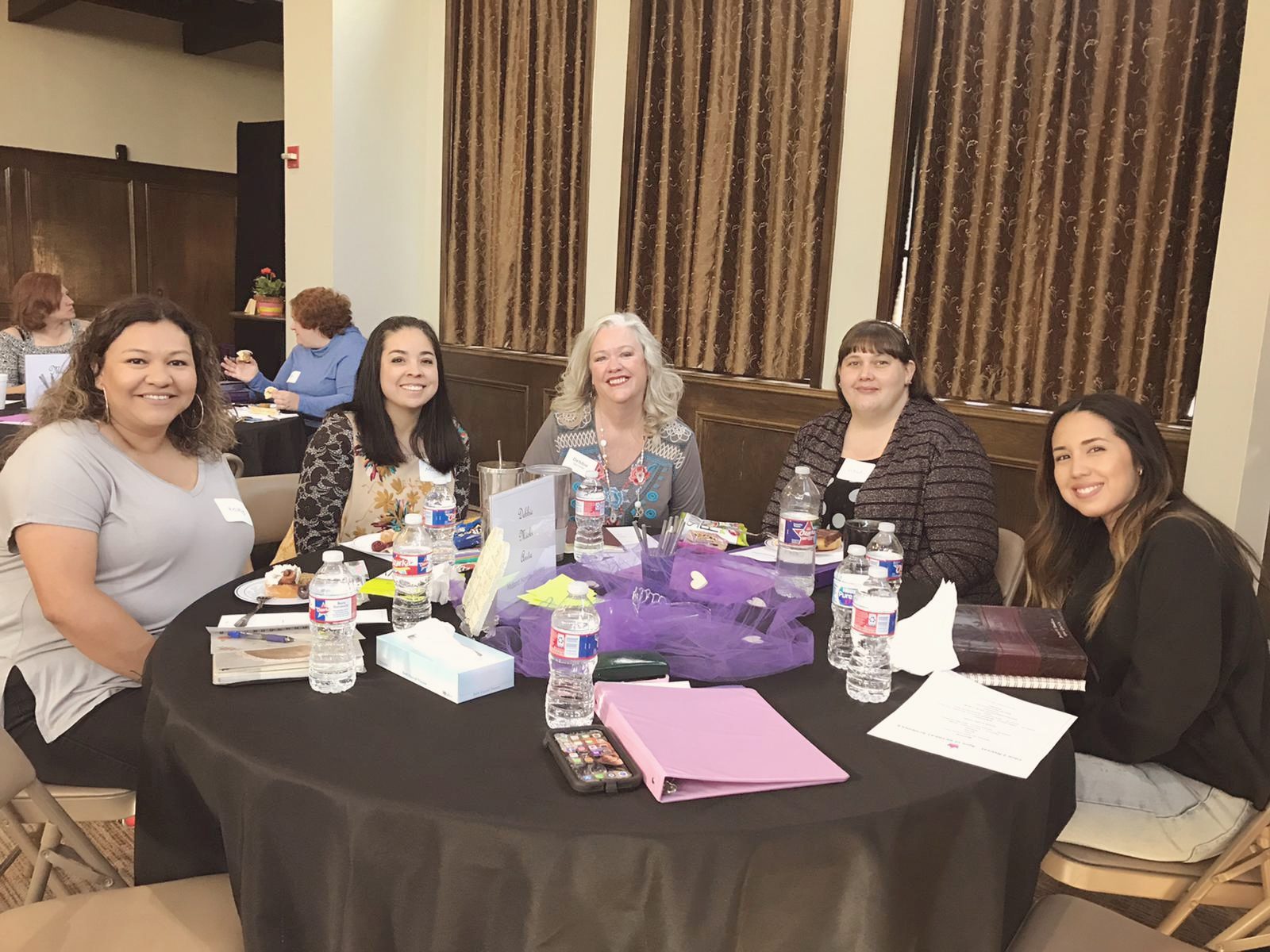 Five women around a table at a Titus 2 night